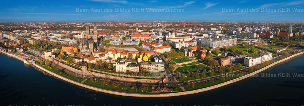 Magdeburg_Elbe_Dom_Schleinufer_1122_PANORAMA | Diese Luftaufnahme gehört zu einer umfangreichen Sammlung weiterer Luftbilder aus Magdeburg. Sie zeigt die Landeshauptstadt aus einer außergewöhnlichen Perspektive und ergänzt die schönsten Ansichten um viele weitere interessante Motive. Selbstverständlich können auch diese Luftbilder als Download oder hochwertiges Wandbild erworben werden.
 - Realisiert mit Pictrs.com