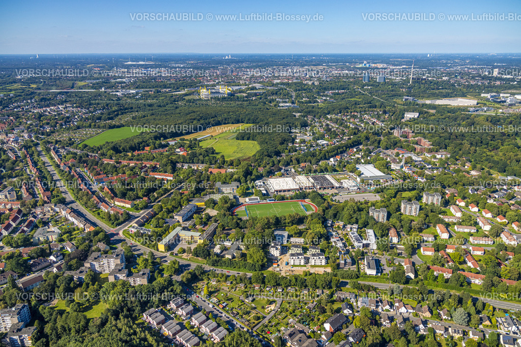 Dortmund240804013 | Luftbild, Neubau Ewige Teufe Wohnanlage Wohnsiedlung, Wohngebiet und Hochhäuser Stargarder Weg, Schulzentrum mit Helene-Lange-Gymnasium, Helene-Lange-Gymnasiumund  Robert-Koch-Realschule, Blick nach Dortmund und zum Fußballstadion des BVB 09, Signal-Iduna-Stadion BundesligaStadion Westfalenstadion, Fußballstadion am Hombruchsfeld,  Brünninghausen, Dortmund, Ruhrgebiet, Nordrhein-Westfalen, Deutschland