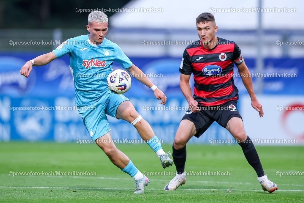 FCVK16092501030 | 16.09.2025, Fußball, FC Viktoria Köln – TSG 1899 Hoffenheim II, 3.Liga, Sportpark Höhenberg, Saison 2025 2026: Paul Hennrich&nbsp;(Hoffenheim II #11) im Zweikampf gegen  Christoph Greger&nbsp;(Viktoria Koeln #15)  DFB regulations prohibit any use of photographs as image sequences and or quasi-video.