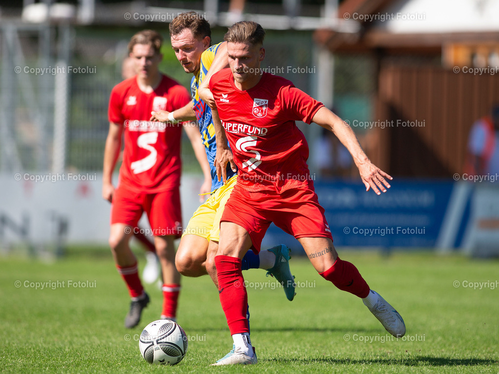 A_LUI120823_21 | SPORT,FUSSBALL,LL. OST ASKOE OEDT 1B-ASKOE DONAU LINZ 12.08.2023 IM BILD: MICHAEL LEONHARTSBERGER  (OEDT 1B) UND FABIAN PALZER (DONAU LINZ) FOTO:FOTOLUI