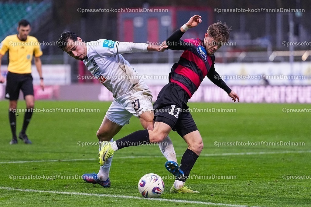 xYDRx06122501062 | 06.12.2025, xydrx, Fußball, 3.Liga, FC Viktoria Köln - SSV Ulm 1846, Saison 2025 2026, Sportpark Höhenberg: Lukas Mazagg (SSV Ulm 1846 #27) im Zweikampf gegen Robin Velasco (FC Viktoria Köln #11)       DFB regulations prohibit any use of photographs as image sequences and or quasi-video.Photo: xYannisxDreimannxPressefotoKochx