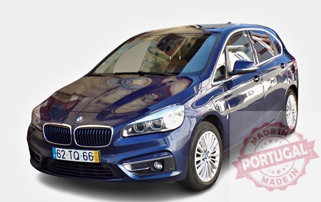 BMW 2 Series Active Tourer parked, showcasing its modern design and family-friendly features | Modern BMW 2 Series Active Tourer, parked and ready for adventure, highlighting its sleek design - Realized with Pictrs.com