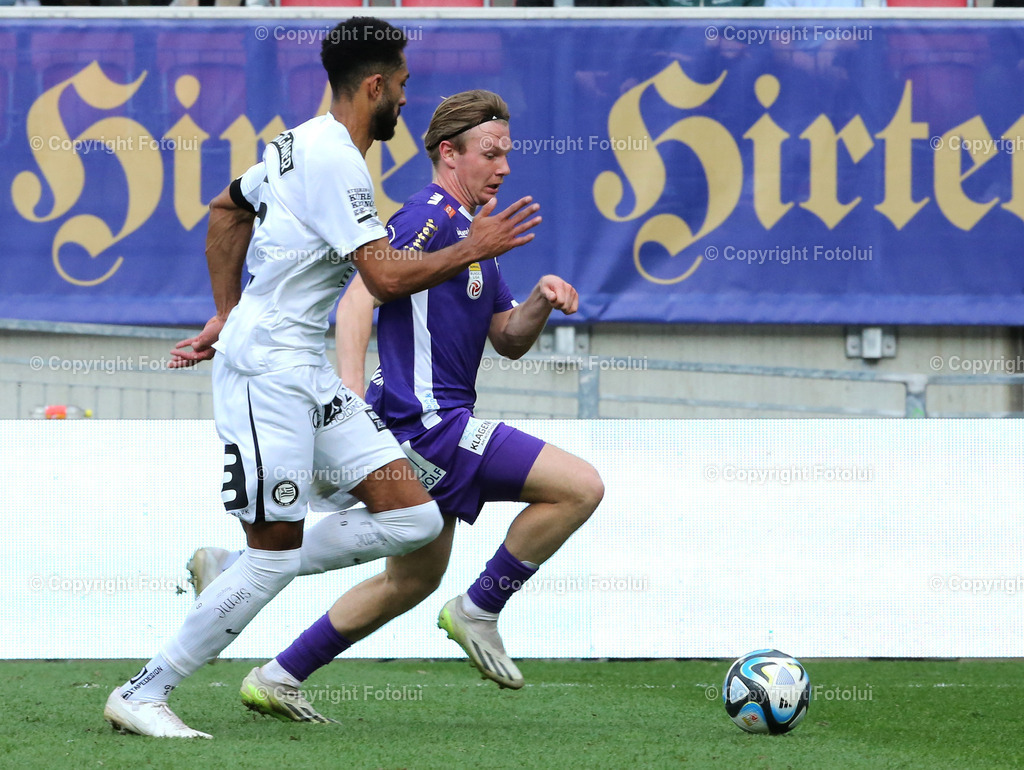A_LUI_17032024_18 | SPORT,FUSSBALL, ADMIRAL BUNDESLIGA AUSTRIA KLAGENFURT-SK STURM GRAZ  17.03.2024 IM BILD: AARON SKY SCHWARZ (KLAGENFURT) UND GREGORY WUETHRICH (STURM GRAZ) FOTO:FOTOLUI/MW