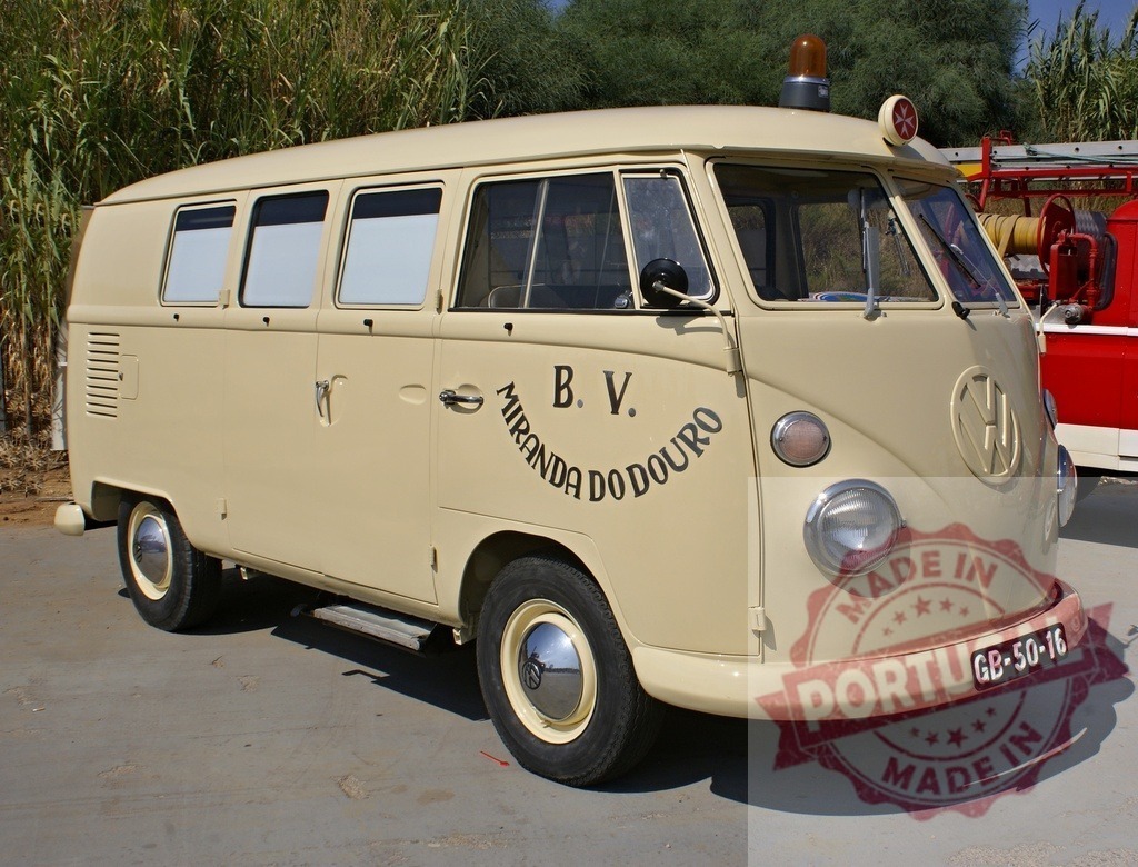 Volkswagen Type 2 vintage ambulance in Miranda do Douro | Volkswagen T1 split screen ambulance parked outdoors on a sunny day - Realized with Pictrs.com