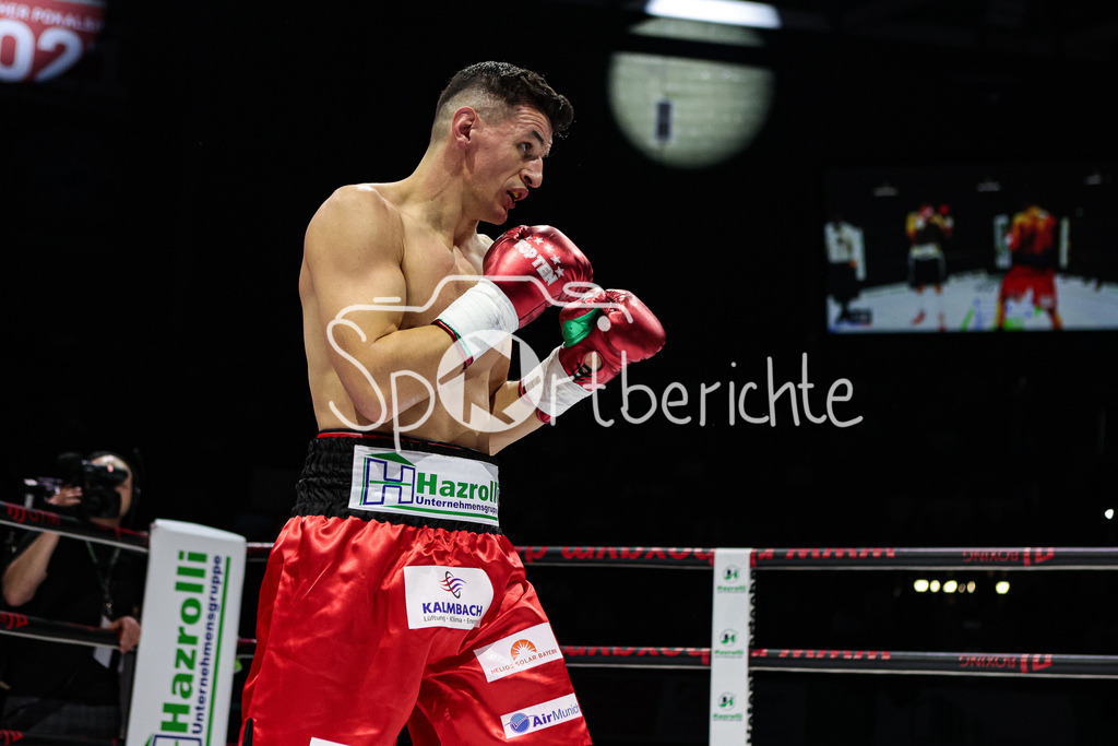 Profi - Box - Gala / Main Event | Robin KRASNIQI (rote Hose) in seinem Kampf gegen Rimour NIKARKHOEV (Schwarze Hose)