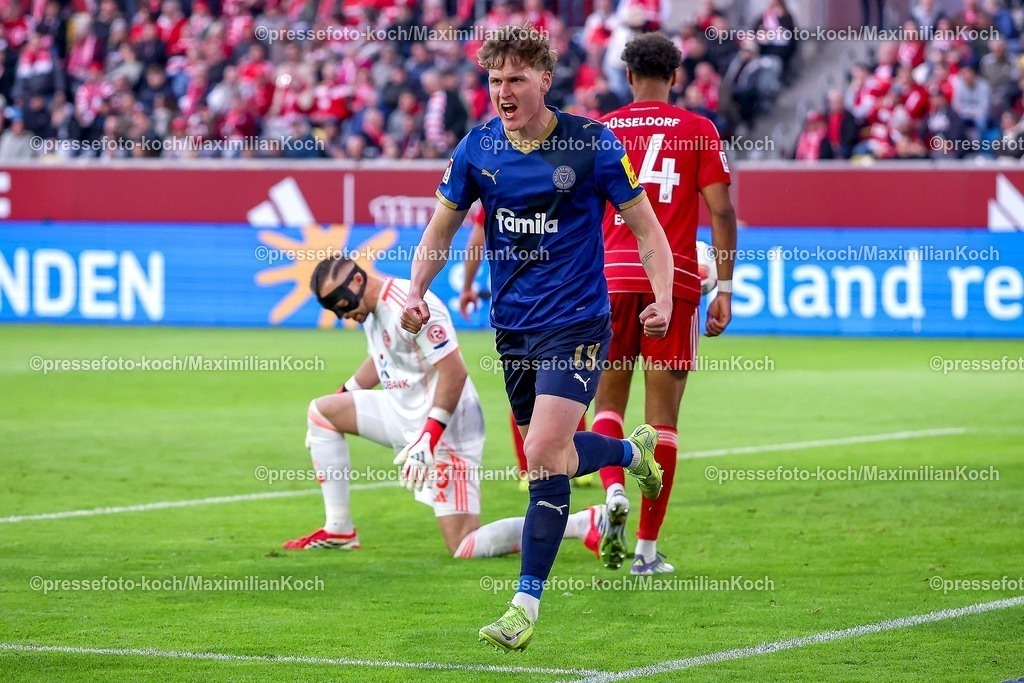 F9510042601067 | 10.04.2026, Fußball, Fortuna Düsseldorf - Holstein Kiel, 2. Fußball Bundesliga, Herren, Merkur Spiel-Arena, 29. Spieltag, Saison 2025 2026: Torjubel nach dem Tor zum 1:0 durch Torschütze Phil Harres&nbsp; (Holstein Kiel #19)  zusammen mit   DFB regulations prohibit any use of photographs as image sequences and or quasi-video.