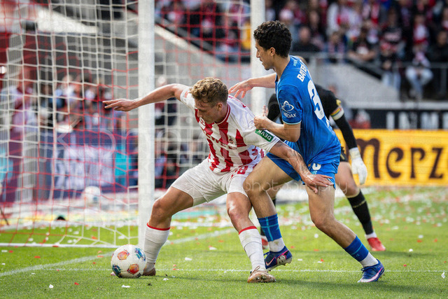 German Bundesliga,  1. FC Koeln - Bayer 04 Leverkusen, 25.04.2026 | KOELN, GERMANY - APRIL 25, 2026 :  Sebastian Sebulonsen (1. FC Koeln, 28), Ibrahim Maza (Bayer 04 Leverkusen, 30) during the German Bundesliga match on gameday 31 between 1. FC Koeln - Bayer 04 Leverkusen at RheinEnergieSTADION on April 25, 2026 in Koeln, Germany. DFL REGULATIONS PROHIBIT ANY USE OF PHOTOGRAPHS AS IMAGE SEQUENCES AND/OR QUASI-VIDEO.