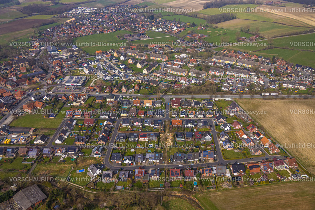 Ahlen240306118Dolberg | Luftbild, Wohngebiet Ortsansicht Ortsteil Dolberg, neuer REWE Supermarkt mit Solardach, Windräder, neuer Kreisverkehr Alleestraße und Uentroper Straße, Neubau Wohngebiet Hases Wiese, Ahlen, Dolberg, Ruhrgebiet, Deutschland