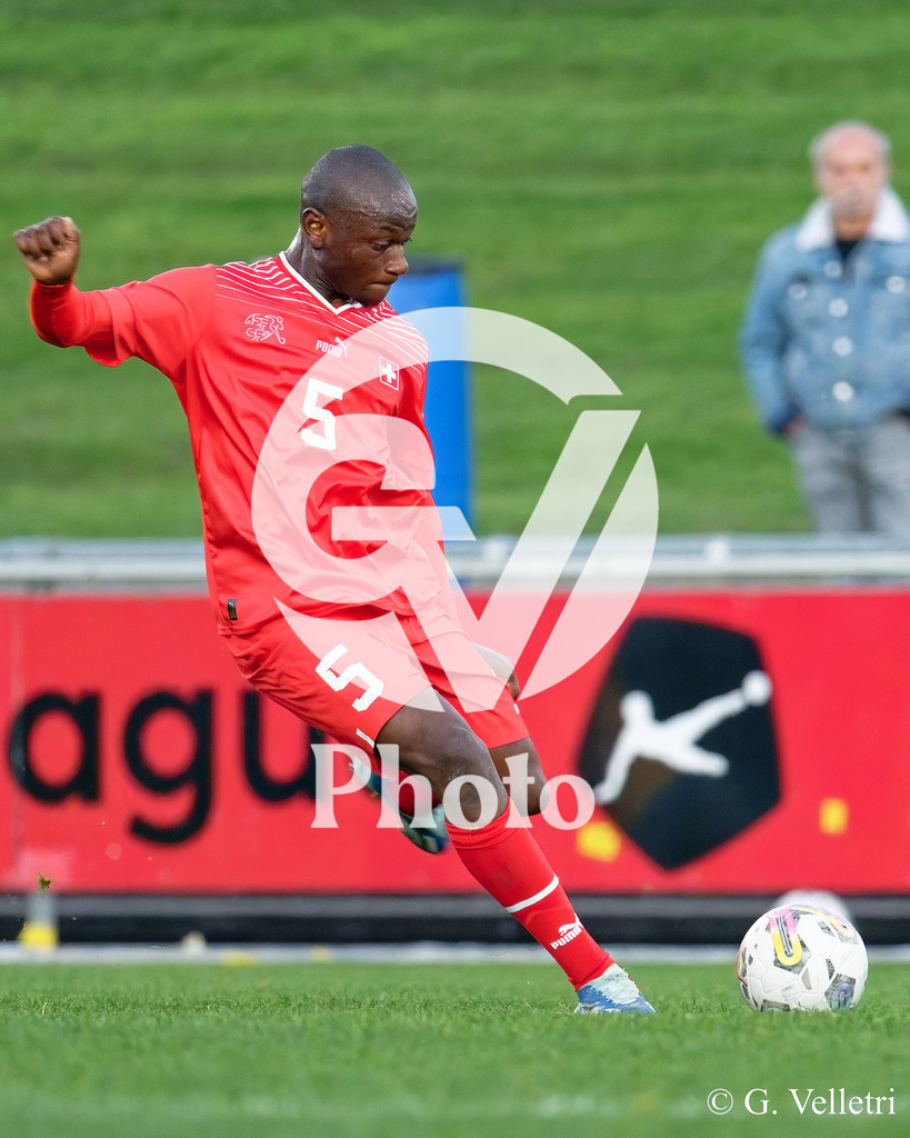 UEFA Region's Cup - Vaud v Munster | Lamine Camara Mamadou (5 Vaud) shoots the ball (action) during the UEFA Region's Cup game between Vaud and Munster at Centre Sportif de Colovray in Nyon, Switzerland 