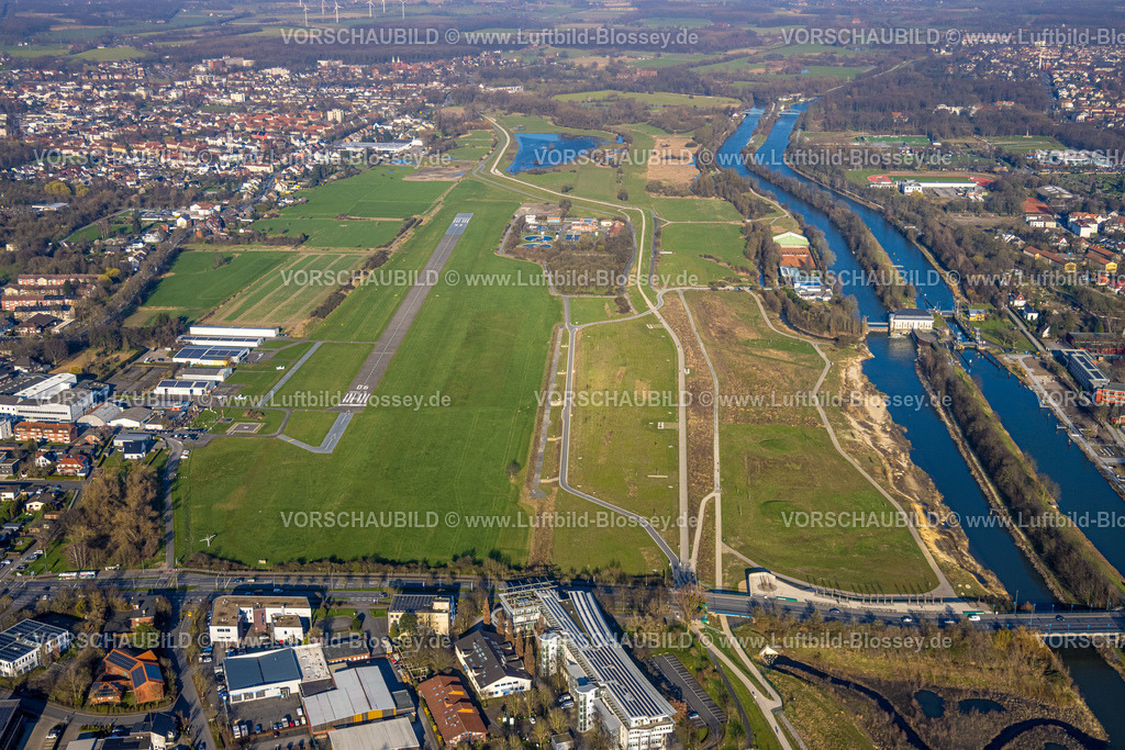 Hamm240305058 | Luftbild, Flugplatz Hamm Lippewiesen, Flugzeuge und Hallen mit Solardach, Fluss Lippe und Datteln-Hamm-Kanal, Kläranlage Hamm Mattenbecke, Stadtbezirk Heessen, Hamm, Ruhrgebiet, Nordrhein-Westfalen, Deutschland