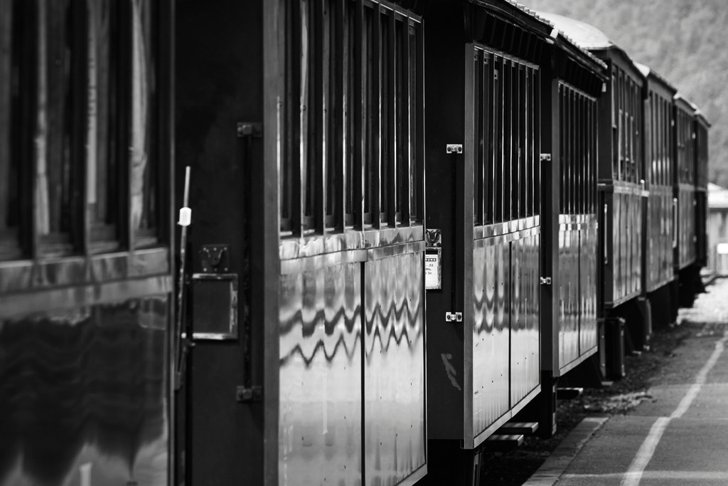 Waggonreihe im Bahnhof | Bezau, Austria - August 07, 2014: Bregenzerwald Bahn; Waggonreihe im Bahnhof. - Realisiert mit Pictrs.com