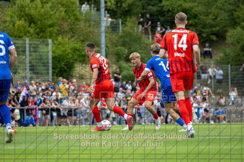 20250706_155249_1012 | #,TSG Salach (blau) vs. 1.FC Heidenheim (rot), Fußball, Freundschaftsspiel - WfV, Saison 2025/2026, Rasensportplatz, Staufenecker Str. 41, 73084 Salach, 06.07.2025 - 15:30 Uhr,Foto: PhotoPeet-Sportfotografie/Peter Harich