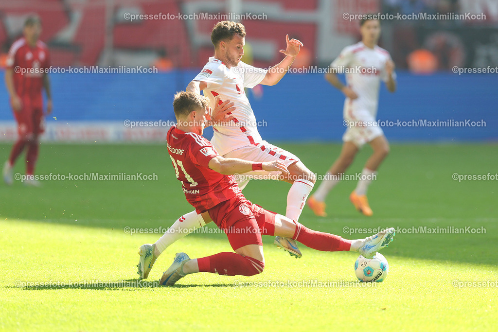 Due21092402131 | 21.09.2024, 2. Fußball Bundesliga, Fortuna Düsseldorf - 1. FC Köln, Merkur Spiel-Arena, Saison 2024 2025: Luca Waldschmidt (1.FC Köln #9) im Zweikampf mit Tim Rossmann (Fortuna Düsseldorf #21) DFB regulations prohibit any use of photographs as image sequences and or quasi-video.