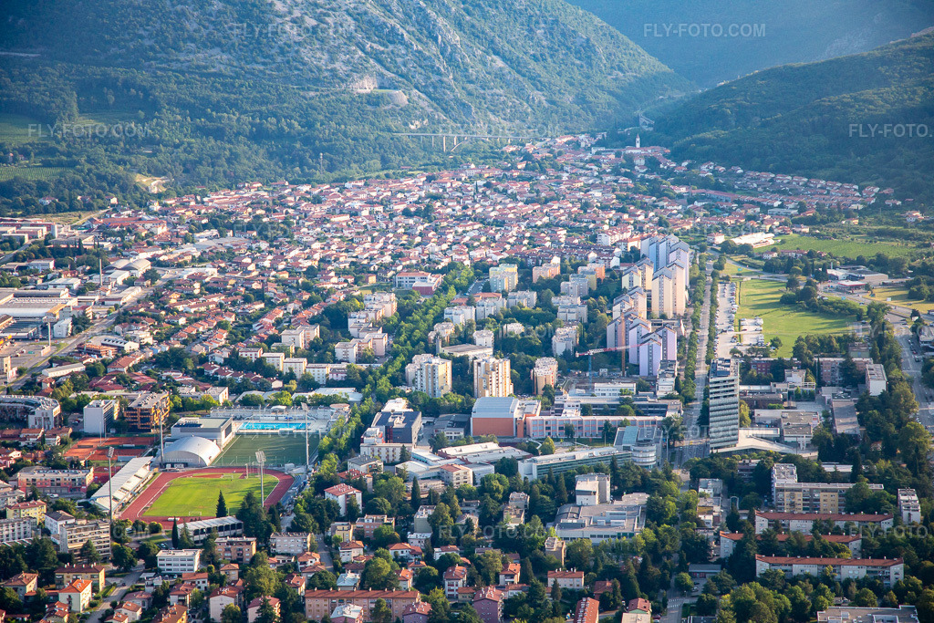 Aerial view: City center East from the south in Nova Gorica in the state Slovenia, Slovenia. – Photo: IMG_137619.jpg taken on 07/16/2023 by Werner Riehm/FLY-FOTO.com – Resolution of the original: 5472 x 3648 px