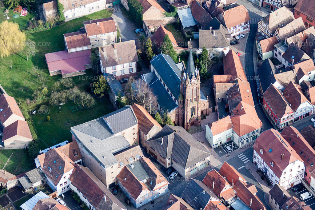 Aerial view: City center in the downtown area of Pfaffenhoffen in Val-de-Moder in the state Bas-Rhin, France. – Photo: IMG_38648.jpg taken on 03/20/2011 by Werner Riehm/FLY-FOTO.com – Resolution of the original: 4431 x 2954 px
