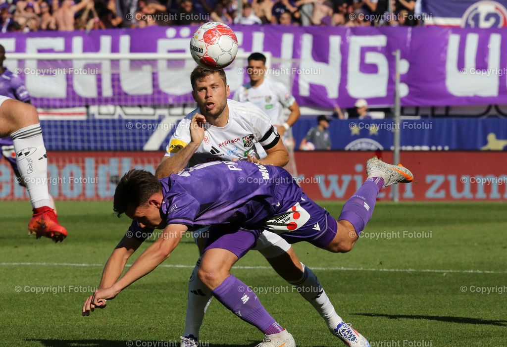 A_LUI_11082024_20 | SPORT,FUSSBALL,ADMIRAL BUNDESLIGA AUSTRIA WIEN-RZ PELLETS WAC  11.08.2024 IM BILD: NIK PRELEC  (AUSTRIA WIEN) UND DOMINIK BAUMGARTNER (WAC) ) FOTO:FOTOLUI/MW