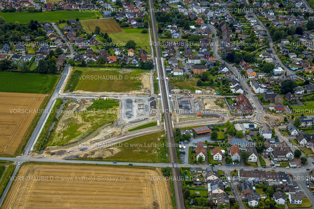 Hamm240710382 | Luftbild, geplante Nahverkehrsverbindung mit Haltepunkt in Westtünnen, Baustelle am Südfeldweg und Von-Thünen-Straße für den künftigen Bahnhaltepunkt, Bahnlinie und Wohnsiedlung, Stadtbezirk Rhynern, Hamm, Ruhrgebiet, Nordrhein-Westfalen, Deutschland