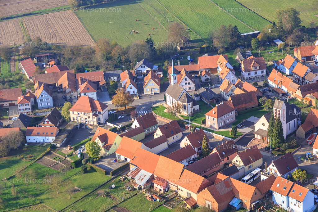 Aerial view: Churches in Buhl in the state Bas-Rhin, France. – Photo: IMG_075651.jpg taken on 11/01/2014 by Werner Riehm/FLY-FOTO.com – Resolution of the original: 5472 x 3648 px