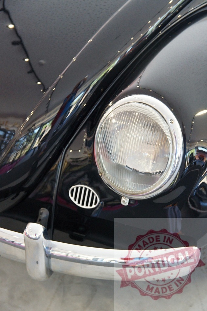 Classic Black Car Headlight and Chrome Bumper Detail | Close-up of vintage car headlight with shiny chrome bumper - Realized with Pictrs.com