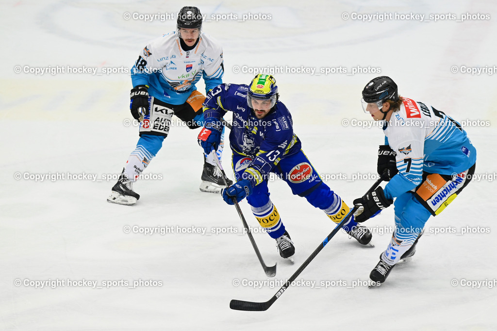 EC IDM WÄRMEPUMPEN VSV vs. Steinbach Black Wings Linz | #7 Brian Lebler Black Wings Linz, #13 Adam Helewka EC VSV, #18 Ken Ograjensek Black Wings Linz, EC IDM WÄRMEPUMPEN VSV vs. Steinbach Black Wings Linz, EC IDM WÄRMEPUMPEN VSV vs. Steinbach Black Wings Linz am 28.11.2025 in Villach (Stadthalle Villach), Austria, (Photo by Bernd Stefan)