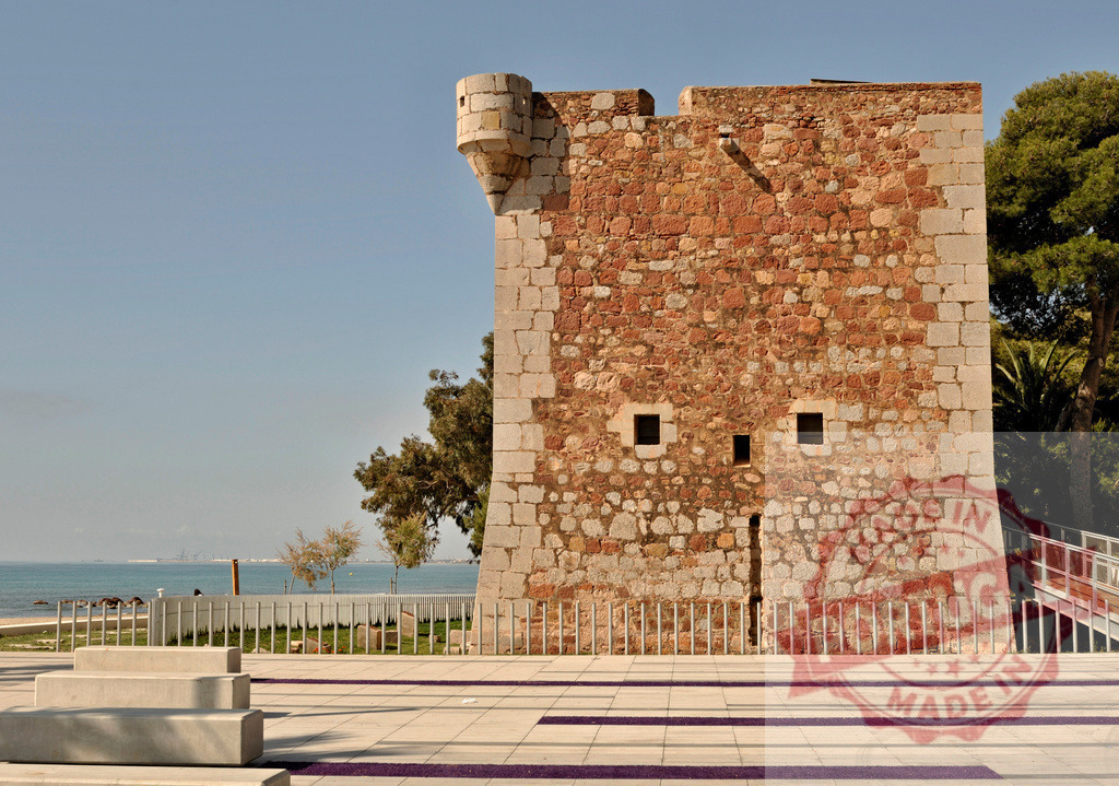 Torre de San Vicente, a historic stone watchtower by the Mediterranean sea | Torre de San Vicente historic watchtower standing by the coast in Benicàssim - Realized with Pictrs.com
