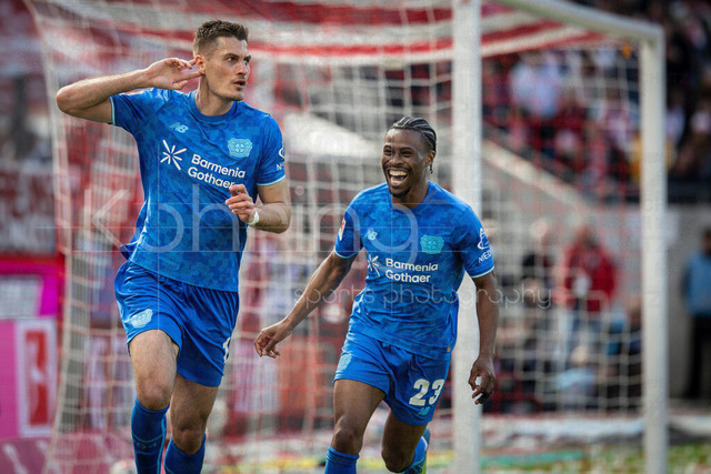 German Bundesliga,  1. FC Koeln - Bayer 04 Leverkusen, 25.04.2026 | KOELN, GERMANY - APRIL 25, 2026 :  Patrik Schick (Bayer 04 Leverkusen, 14) celebrates scoring his team's second goal with Nathan Tella (Bayer 04 Leverkusen, 23) during the German Bundesliga match on gameday 31 between 1. FC Koeln - Bayer 04 Leverkusen at RheinEnergieSTADION on April 25, 2026 in Koeln, Germany. DFL REGULATIONS PROHIBIT ANY USE OF PHOTOGRAPHS AS IMAGE SEQUENCES AND/OR QUASI-VIDEO.