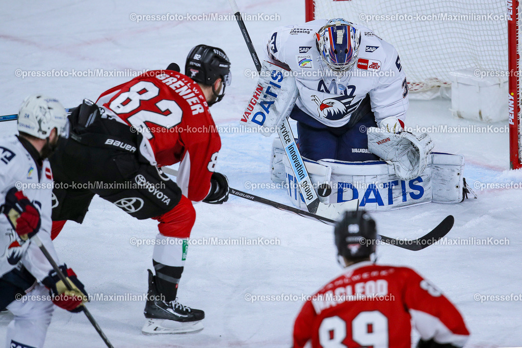 KoeDEL08032401058 | 08.03.2024, Köln, Eishockey, Penny DEL, 52. Spieltag, Lanxess-Arena, Kölner Haie - Adler Mannheim: Alexander Grenier (Kölner Haie) schiesst auf das Tor von Torhüter Arno Tiefensee (Adler Mannheim)