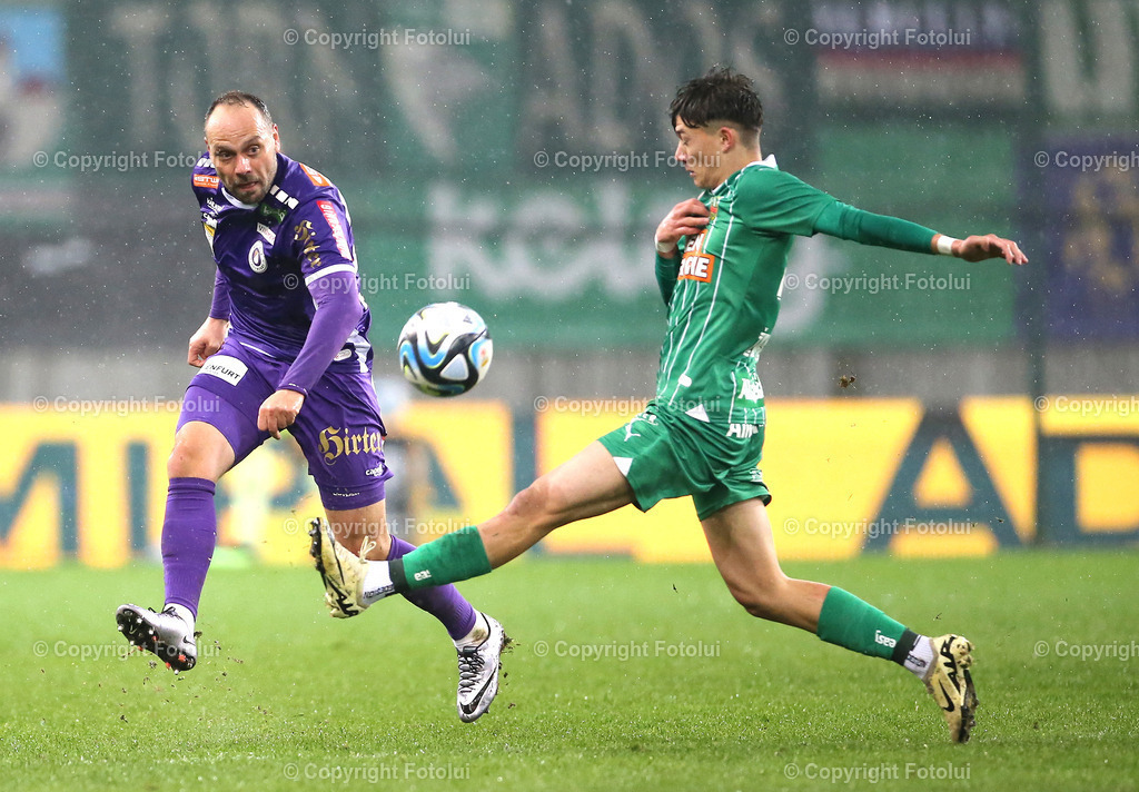 A_LUI_10032024_08 | SPORT,FUSSBALL, ADMIRAL BUNDESLIGA AUSTRIA KLAGENFURT-SK RAPID WIEN 10.03.2024 IM BILD: RICO BENATELLI (KLAGENFURT) UND FURKAN DURSUN (RAPID WIEN) FOTO:FOTOLUI/MW
