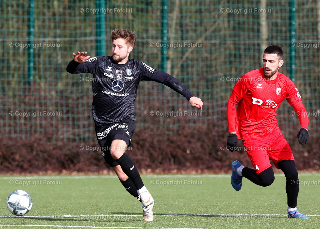 A_LUI_01022025_17 | SPORT FUSSBALL TESTSPIEL ASKOE OEDT 1B-UFC HAMA TRUCKS ROHRBACH-BERG 01.02.2025IM BILD : JOVAN PETROVIC  (OEDT1B) UND BENEDIKT SCHAUBMAIER (ROHRBACH) FOTO:FOTOLUI