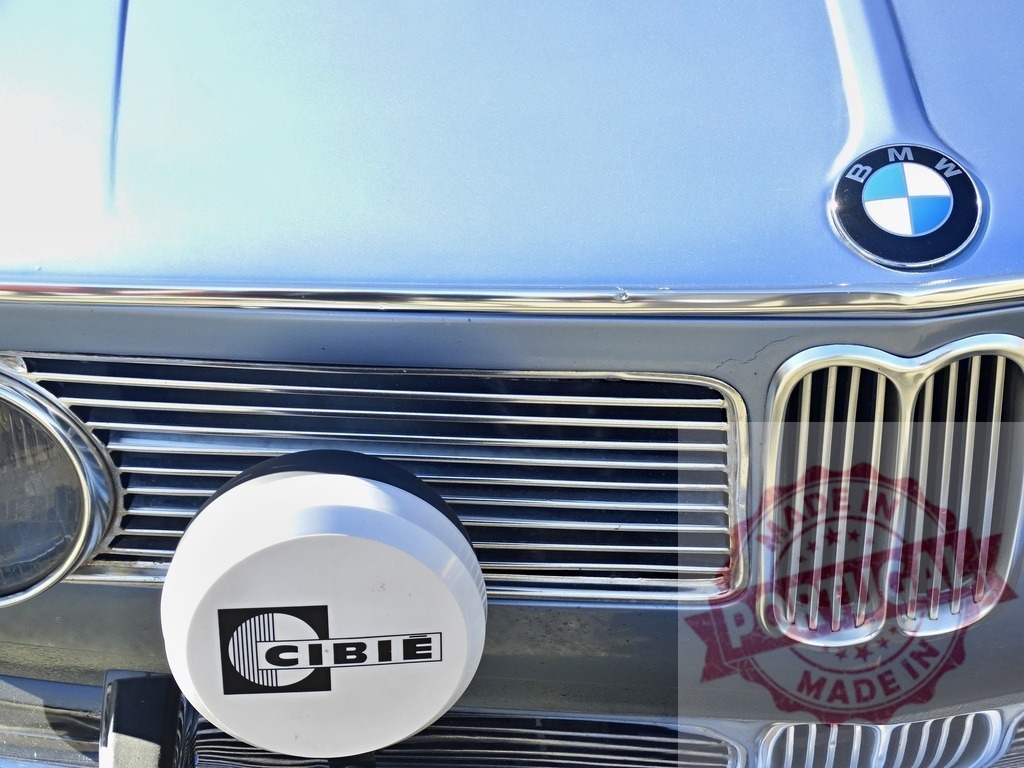 BMW vintage classic car front grille headlight | BMW classic car front section showing grille, emblem, headlight, and Cibie rally light - Realized with Pictrs.com