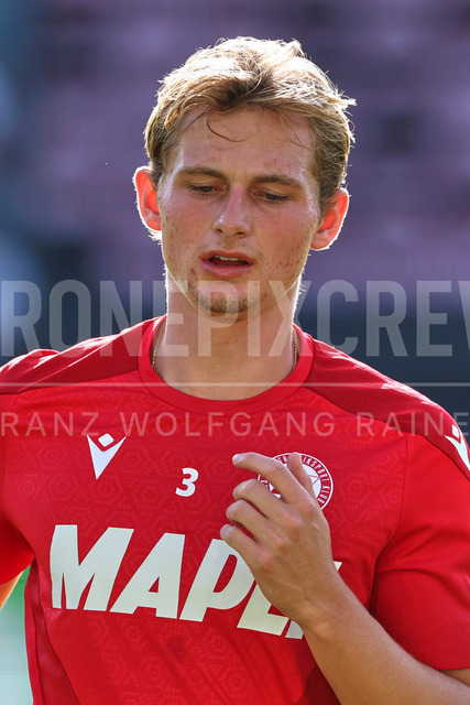 Grazer AK 1902 vs TSV Egger Glas Hartberg – Austrian Bundesliga Match 2025 | Austrian Bundesliga match between Grazer AK 1902 and TSV Egger Glas Hartberg. Dynamic football action, players in motion, emotions, stadium atmosphere and team spirit captured in professional detail. The image shows Ludwig Vraa-Jensen (GAK).