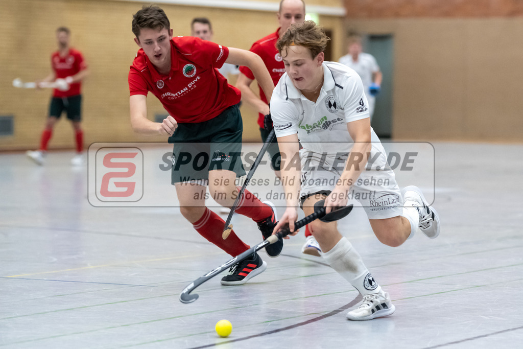 SFE_20230115_0158 | 1. Bundesliga Hockey Herren Schwarz-Weiss Neuss - Crefelder HTC am 15.01.2023 in  (Sporthalle Jahnerstrasse), Photo: Stephan Fehrmann 2022 (Sports-Gallery),Schröder Mika ( Crefelder HTC #33 ),Finn LangHeinrich ( Schwarz-Weiss Neuss #15 )