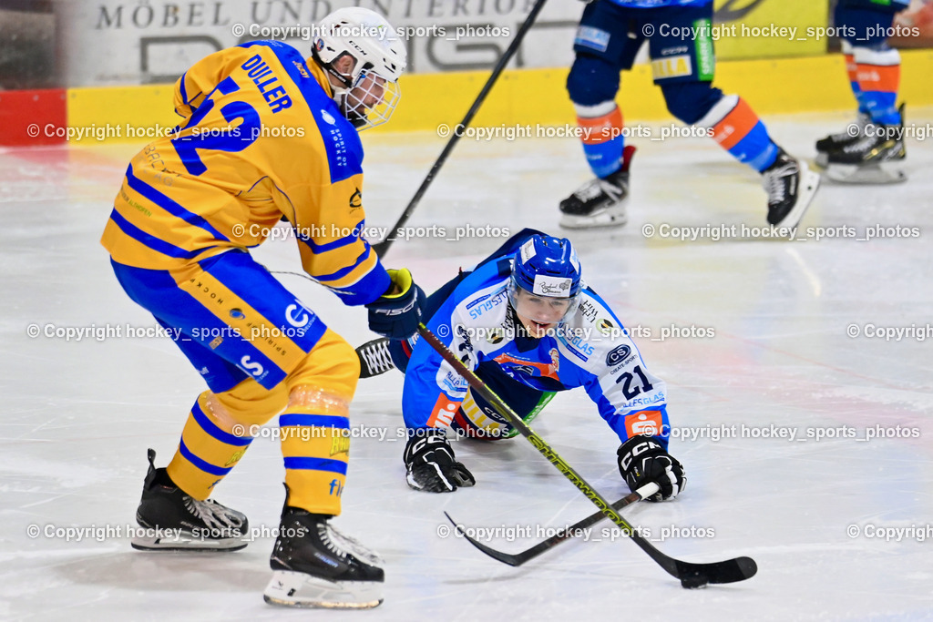ESC SPARKASSE STEINDORF vs. 1. EHC ALTHOFEN | #52 Duller Christoph EHC Althofen, #21 Walder Patrik ESC Steindorf, ESC SPARKASSE STEINDORF vs. 1. EHC ALTHOFEN, ESC SPARKASSE STEINDORF vs. 1. EHC ALTHOFEN am 30.11.2025 in Steindorf (Ossiachersee Halle), Austria, (Photo by Bernd Stefan)