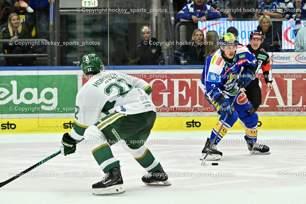 EC IDM WÄRMEPUMPEN VSV vs. FTC-TELEKOM JÉGKORONG | #22 Milan Horvath FTC-Telekom, #2 Dylan MacPherson EC VSV, EC IDM WÄRMEPUMPEN VSV vs. FTC-TELEKOM JÉGKORONG, EC IDM WÄRMEPUMPEN VSV vs. FTC-TELEKOM JÉGKORONG am 19.10.2025 in Villach (Stadthalle Villach), Austria, (Photo by Bernd Stefan)