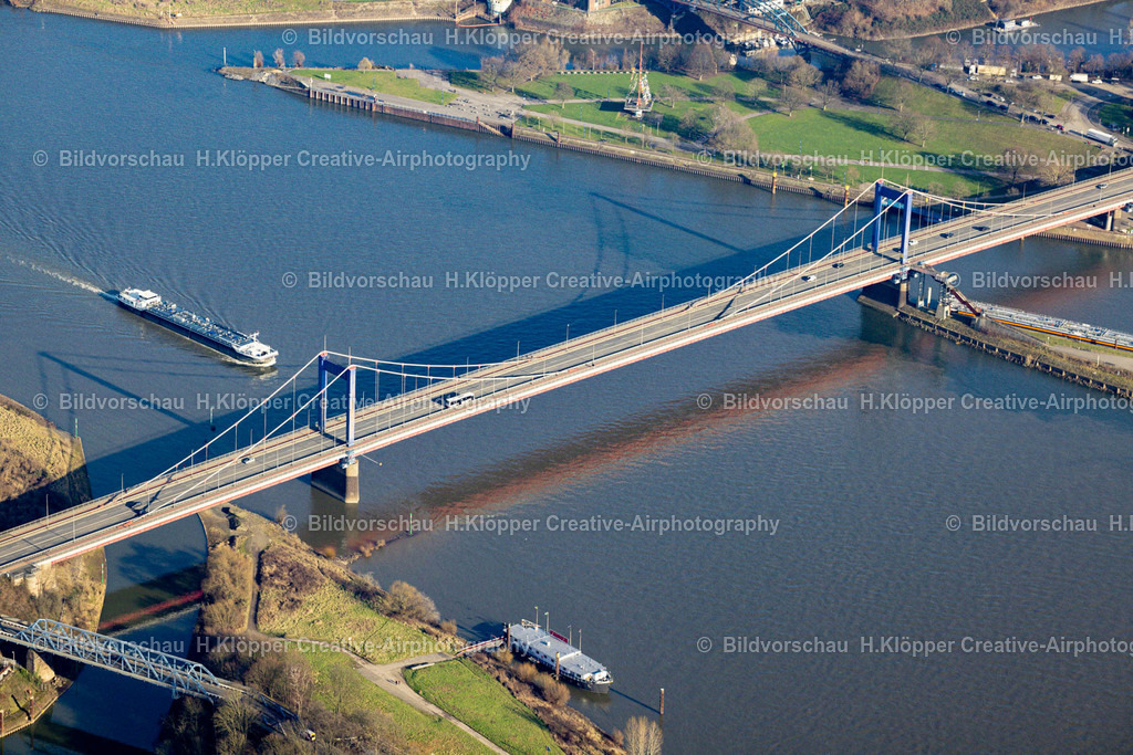 Luftbild Duisburg-8762 | Luftbildfotografie Friedrich-Ebert-Brücke über den Rhein am Hafen entlang der Rheindeichstraße - Dammstraße in Duisburg im Bundesland Nordrhein-Westfalen - Realisiert mit Pictrs.com