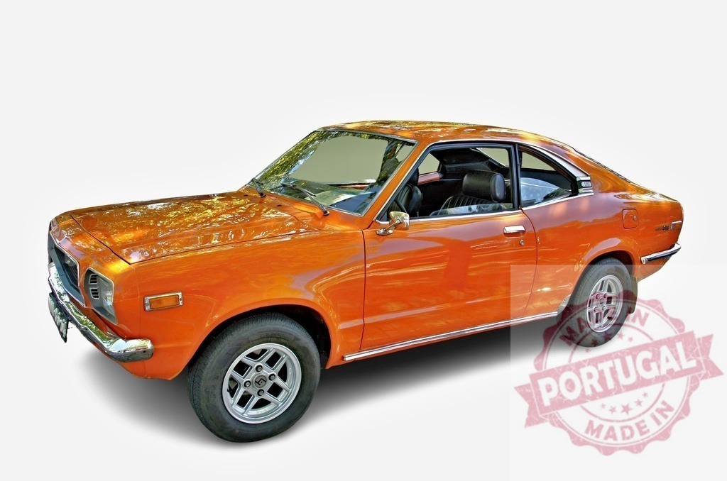 Orange Mazda 808 coupe reflecting trees is parked on white background | Classic orange Mazda 808 coupe reflecting trees parked on white background - Realized with Pictrs.com