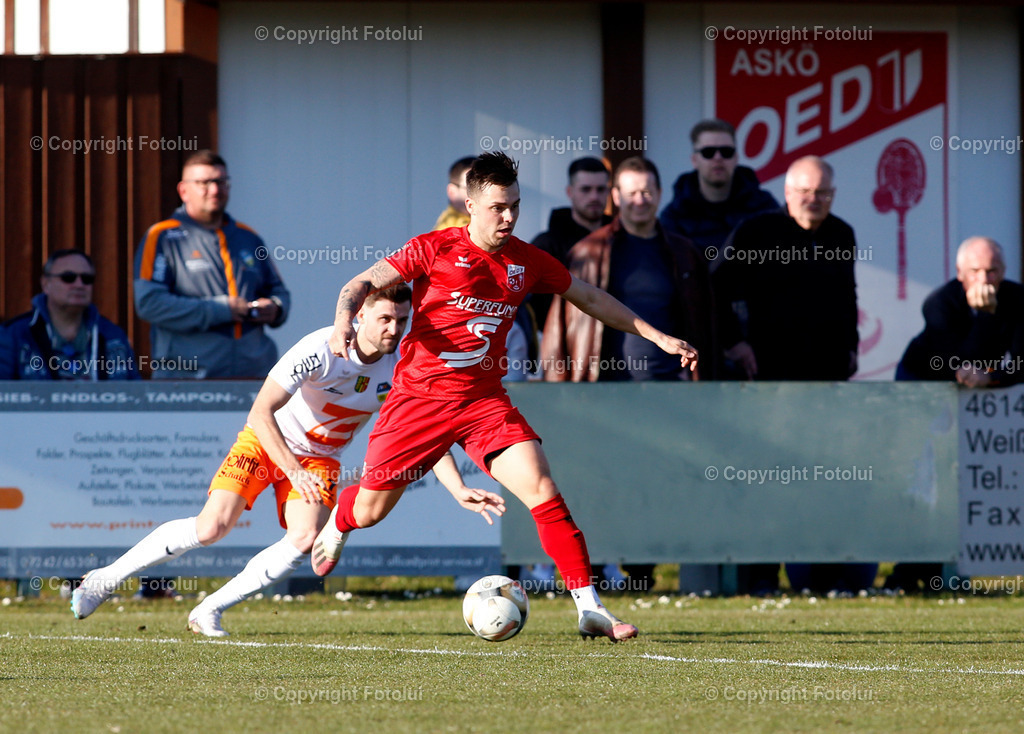 A_LUI_18032023_19 | SPORT,FUSSBALL,LT1 OOE LIGA ASKOE OEDT-SPG WALLERN/ST.MARIENKIRCHNEN 18.03.2023 IM BILD: MICHAEL LERCHER (OEDT) UND PHILLIPP HUSPEK (SPGWALLERN) FOTO:FOTOLUI