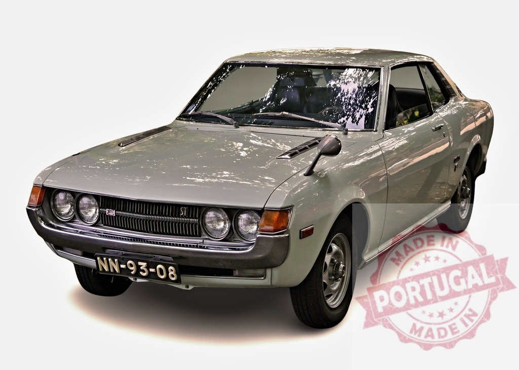 Classic Toyota Celica ST Coupe posing on white background | Vintage light green Toyota Celica ST Coupe manufactured in the 1970s parked on a white background - Realisiert mit Pictrs.com