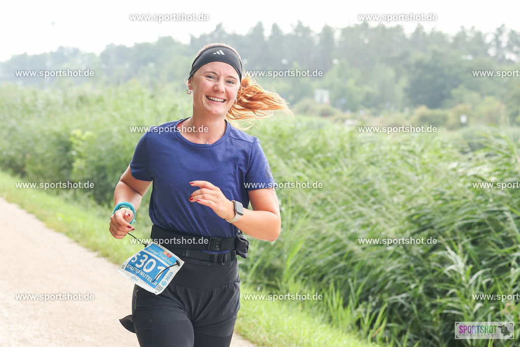 LUR_1484 | 34. M-net Erlanger Triathlon 2025 #erlangertriathlon  #mnettriathlon2025 #mnettriathlon #team #olympischedistanz #mitteldistanz #triathlon #maindonaukanal  #erlangertriathlon2025 #yourpictrs #tv1848 #tv1848erlangen  #triathlonbayern #sportinerlangen #demsportverbunden #sportshot_your_pictrs Copyright: www.sportshot.de