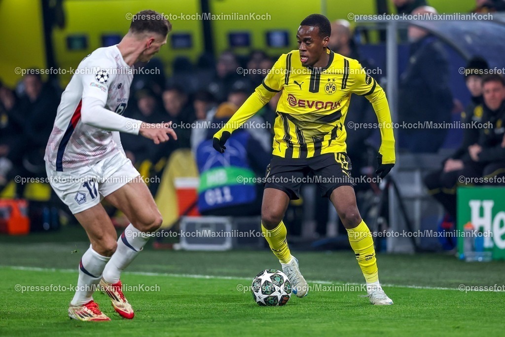UCL04032501016 | 04.03.2025, Fußball, UEFA Champions League, Borussia Dortmund - OSC Lille, Signal Iduna Park, Runde der 16, Saison 2024 2025: Thomas Meunier (LOSC Lille #12) im Zweikampf gegen Jamie Gittens (BVB #43)