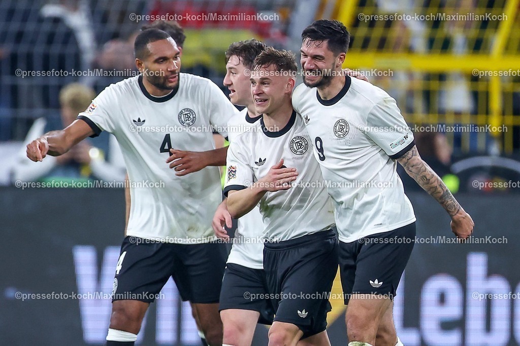 DFB23032501067 | 23.03.2025, Fußball, Viertelfinale UEFA Nations League, Deutschland - Italien, Signal Iduna Park, Saison 2024 2025: Torjubel nach dem Tor zum 3:0 durch Torschütze Tim Kleindienst (GER #09) zusammen mit Joshua Kimmich (GER #06) DFB regulations prohibit any use of photographs as image sequences and or quasi-video.