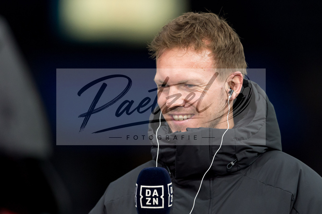 BSCFCB20220123_181 | Fussball, Herren: Trainer Julian Nagelsmann (FC Bayern Muenchen) im Interview bei dem Spiel der 1. Bundesliga zwischen Hertha BSC und FC Bayern Muenchen im Olypiastadion am 23.01.2022 in Berlin, Deutschland.DFB / DFL REGULATIONS PROHIBIT ANY USE OF PHOTOGRAPHS AS IMAGE SEQUENCES AND/OR QUASI-VIDEO. - Realisiert mit Pictrs.com