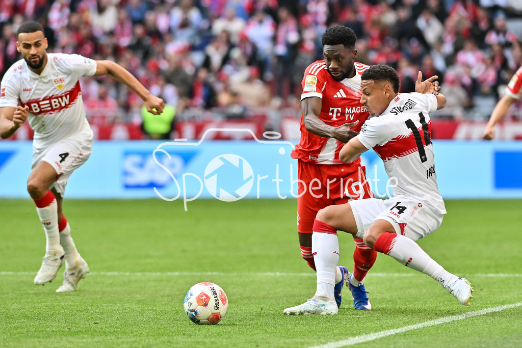 FC Bayern München - VfB Stuttgart | MUNICH, GERMANY - 19. APRIL: tackle between Alphonso DAVIES (FC Bayern Munich 19) and Luca Antony JAQUEZ (VfB Stuttgart 14) during the Bundesliga Match between FC Bayern Munich vs. VfB Stuttgart at Matchday 30 at Allianz Arena / DFL REGULATIONS PROHIBIT ANY USE OF PHOTOGRAPHS AS IMAGE SEQUENCES AND/OR QUASI-VIDEO