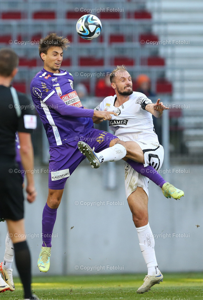 A_LUI_121123_02 | SPORT,FUSSBALL,ADMIRAL BUNDESLIGA AUSTRIA KLAGENFURT-STURM GRAZ 12.11.2023
IM BILD: JON STANKOVIC (STURM GRAZ ) UND T HORSTEN MAHRER(KLAGENGURT)FOTO: FOTOLUI