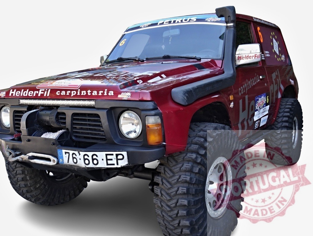 Nissan patrol showcasing off-road modifications | Red nissan patrol, modified for off-roading, standing out with its snorkel and winch - Realized with Pictrs.com