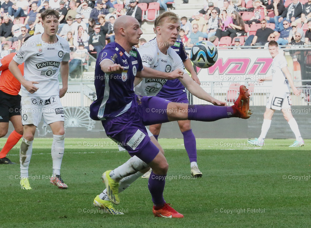 A_LUI_17032024_10 | SPORT,FUSSBALL, ADMIRAL BUNDESLIGA AUSTRIA KLAGENFURT-SK STURM GRAZ  17.03.2024 IM BILD: NICOLAS WIMMER  (KLAGENFURT) UND MIKA BIERETH (STURM GRAZ) FOTO:FOTOLUI/MW