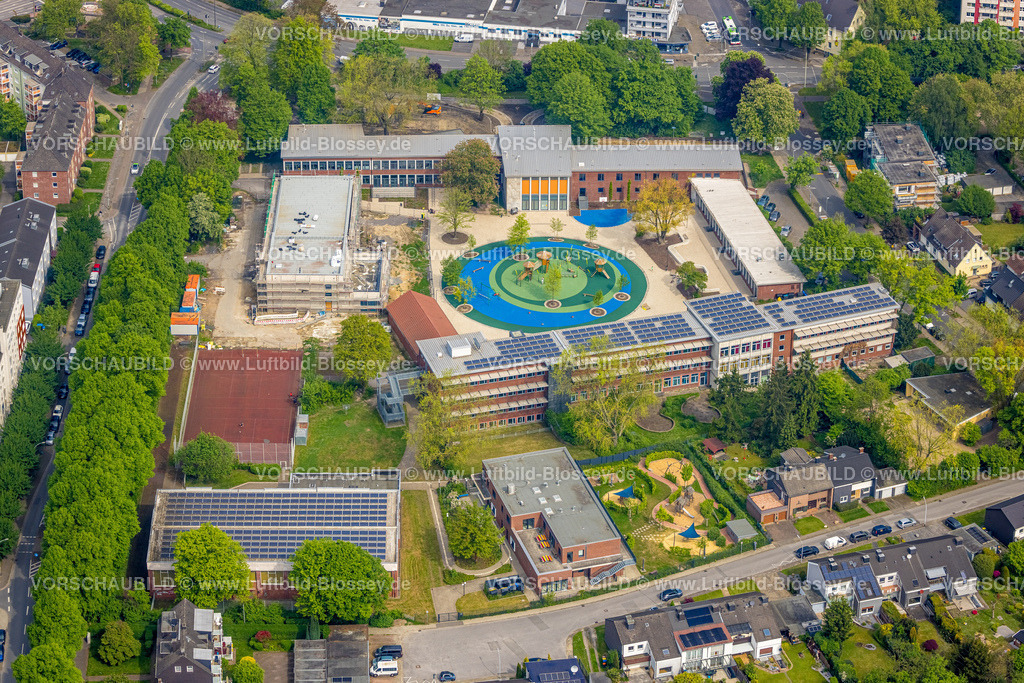 Herne240500352 | Luftbild, Stadtteilzentrum H2Ö gemeinnützige Einrichtung und Kolibri-Schule mit Solardach, bunte kreisrunde Innenraumfläche, Herne-Süd, Herne, Ruhrgebiet, Nordrhein-Westfalen, Deutschland
