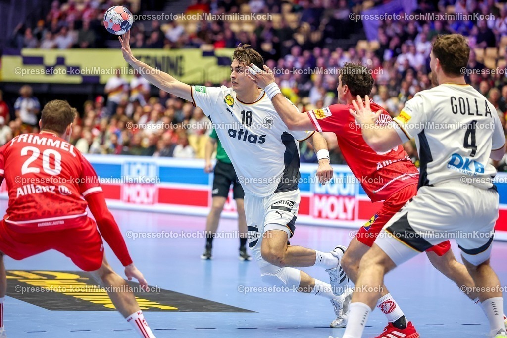 EHF15012602074 | 15.01.2026, Handball, Men's EHF EURO 2026, Deutschland - Östereich, Jyske Bank Boxen in Herning, Dänemark, Preliminary Round:  Julian Köster (Germany #18) im Zweikampf gegen   Sebastian Frimmel (Austria #20)  Elias Kofler (Austria #66) 