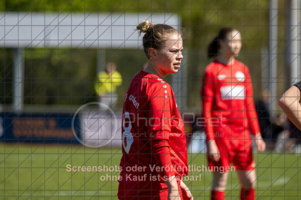 20250406_141354_0158 | #,1.FC Donzdorf (rot) vs. SV Jungingen (schwarz), Fussball, Frauen-Verbandsliga Württemberg, 16. Spieltag, Saison 2024/2025, Rasenplatz Lautertal Stadion, Süßener Straße 16, 73072 Donzdorf, 06.04.2025 - 13:00 Uhr,Foto: PhotoPeet-Sportfotografie/Peter Harich