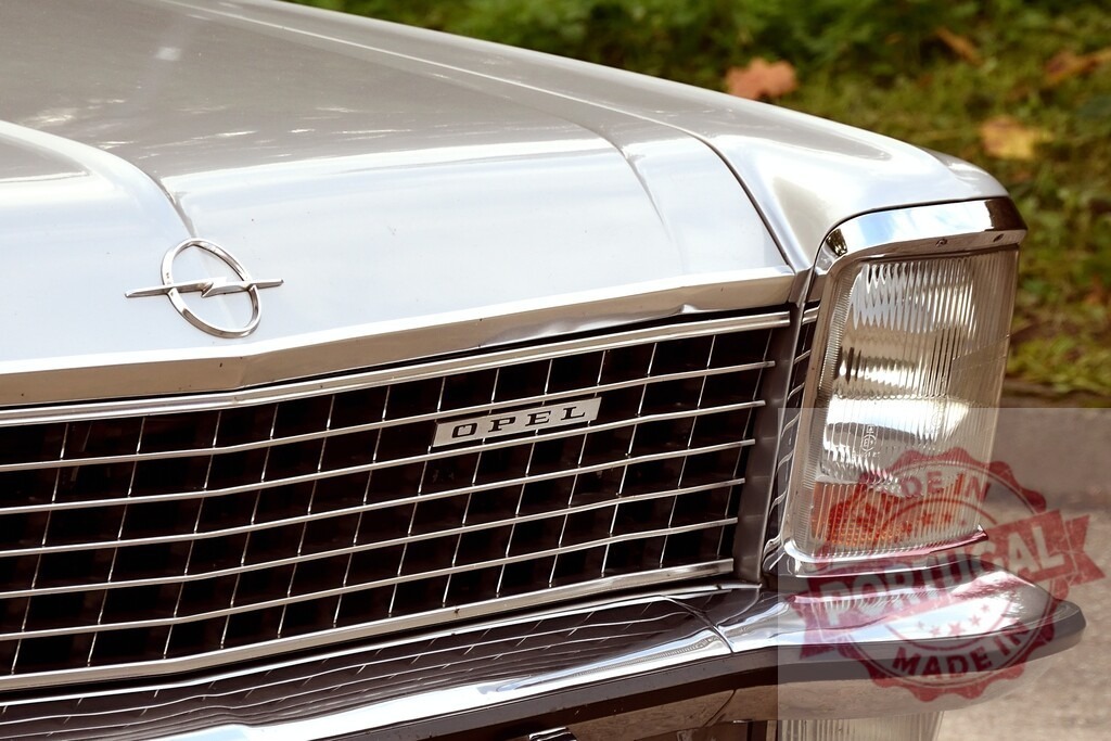 Opel classic car chrome grille and headlight detailed | Opel classic car silver chrome grille, emblem, and headlight in detail - Realized with Pictrs.com